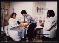 Medical Student taking blood pressure 